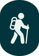 Icon of a person hiking with a backpack and walking stick, on a dark green oval background.
